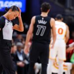 nba-referee-goes-down-hard-after-brutal-collision-with-camera-operator-during-hawks-nets-game