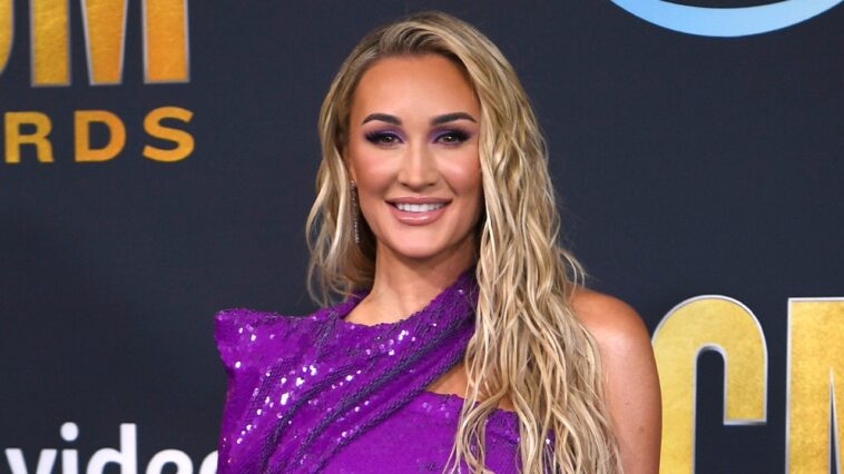 brittany-aldean-shows-off-green-bikini-in-spring-break-beach-photos-with-family