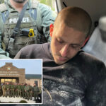 ex-con-accused-of-killing-2-people-outside-players-championship-pictured-sulking-in-back-of-police-cruiser-after-arrest