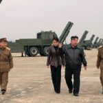 kim-jong-un-appears-with-teenage-daughter-at-live-fire-rocket-test-in-north-korea