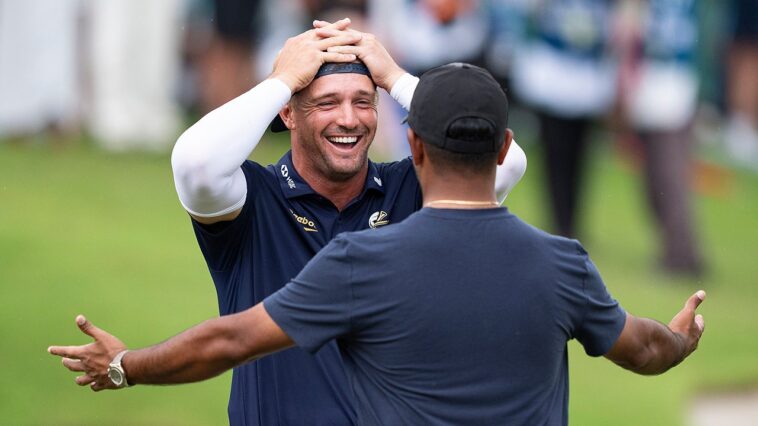 bryson-dechambeau-wins-liv-golf-singapore-event,-surviving-bunker-fall-and-agonizing-playoff