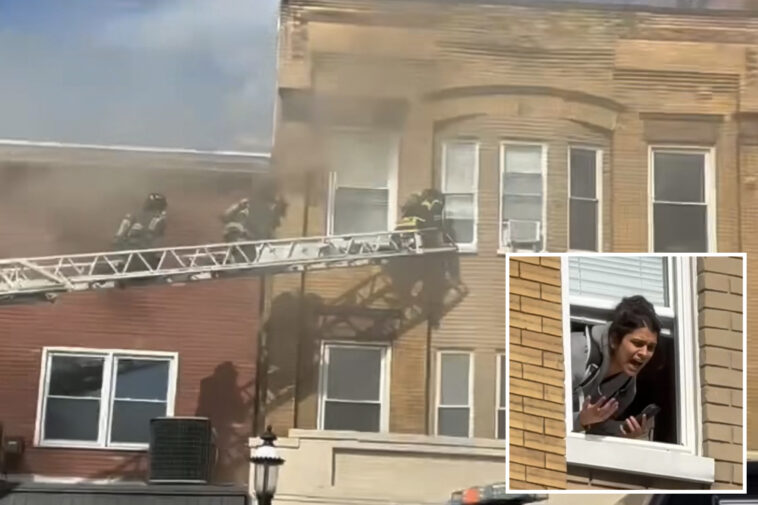 nj-firefighters-rescue-woman-through-top-floor-window-of-high-rise-in-dramatic-video