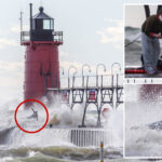 heart-stopping-photos-show-huge-wave-sweep-man-off-lake-michigan-pier