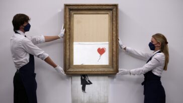 banksy’s-face-revealed-in-only-known-photos-of-the-elusive-artist