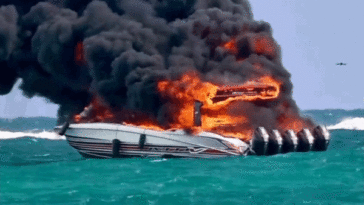 dramatic-video-captures-tourist-boat-engulfed-in-flames-as-passengers-scramble-to-escape-burning-vessel