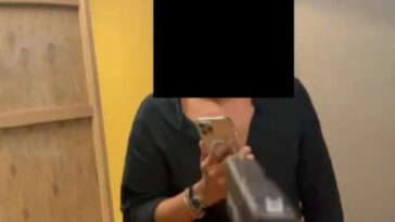 shocking-picture-blows-the-lid-on-la-sheriff-deputy’s-crypto-racket,-holding-rival-at-gunpoint