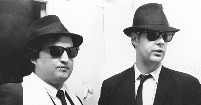 watch:-trans-person-dressed-like-a-‘blues-brother’-suspected-of-murder-after-standoff-at-elderly-millionaire’s-beach-house