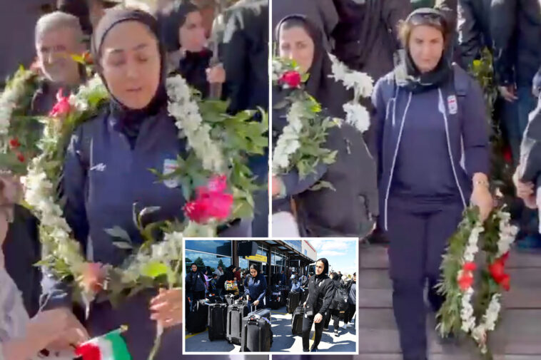 iranian-women’s-soccer-players-look-terrified-as-they-are-greeted-back-home-by-officials-after-being-branded-‘traitors’