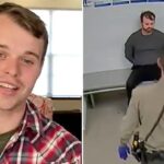 joseph-duggar-searched-with-hands-against-wall-in-booking-video-after-child-molestation-arrest