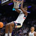 reed-in-rare-air-with-31-27-night-as-uconn-escapes