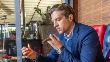 man-smokes-cigar-in-desperate-hope-to-feel-sick-and-become-unattractive-to-wife