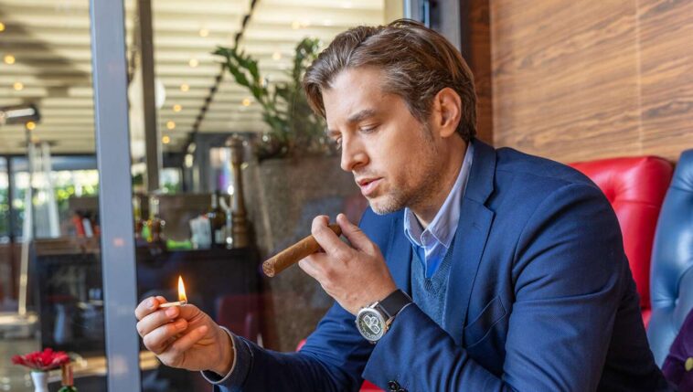 man-smokes-cigar-in-desperate-hope-to-feel-sick-and-become-unattractive-to-wife