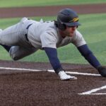 college-baseball-pitcher-shoves-runner-on-tag-out,-sparking-benches-to-clear