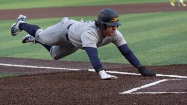 college-baseball-pitcher-shoves-runner-on-tag-out,-sparking-benches-to-clear