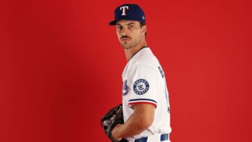 texas-rookie-gets-mound-visit,-told-he-made-team