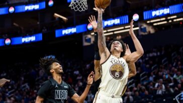 tanking-nets-battle-but-fall-to-warriors-for-ninth-straight-loss