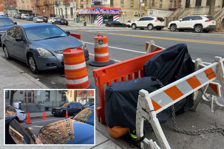 nyc-parking-wars-has-drivers-saving-spots-with-cones,-con-ed-barriers-and-even-derelict-e-bikes