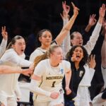 olson-leads-michigan-past-louisville-into-elite-8