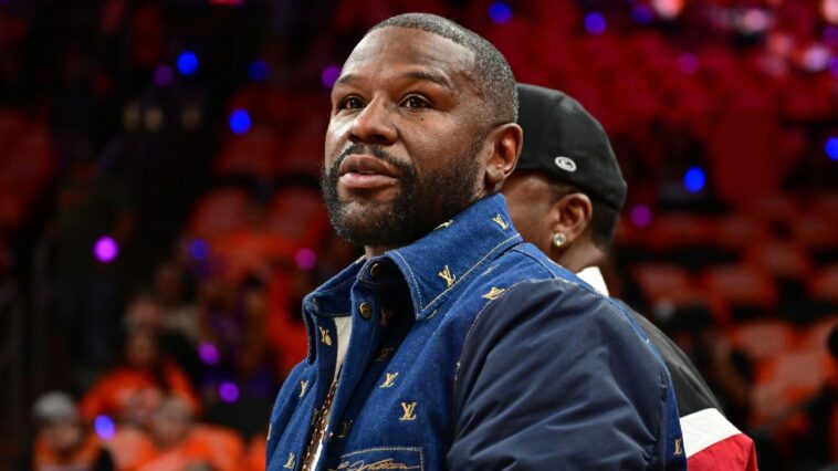 mayweather-pumps-brakes-on-pacquiao-rematch