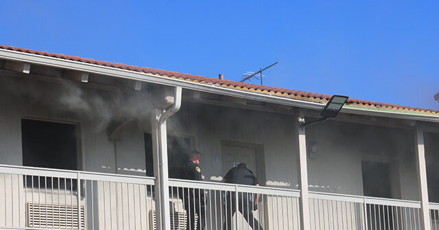 watch:-two-texas-cops-charge-through-burning-motel-and-save-guests