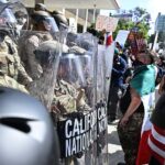 ‘no-kings’-protest-turns-into-riot-as-projectiles-fly,-‘kill’-message-found-on-federal-building