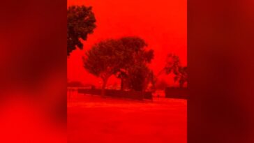 watch:-australian-skies-turn-fiery-red-as-tropical-cyclone-narelle-hits