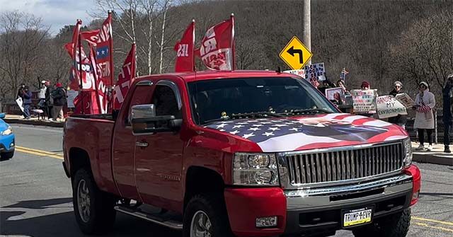 watch:-trump-supporter-in-big-red-truck-trolls-leftist-‘no-kings’-protesters