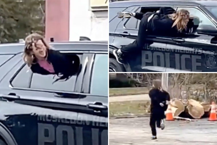 wild-video-captures-handcuffed-woman-wriggle-out-of-michigan-police-cruiser,-sprint-away-without-cops-noticing