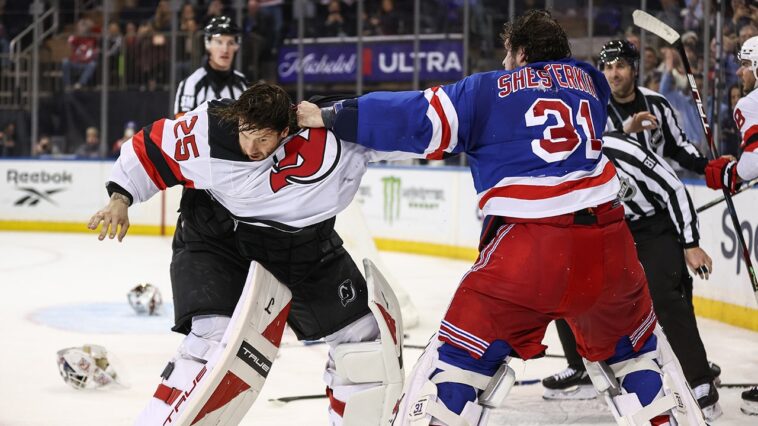 rangers,-devils-goalies-battle-in-wild-fight-during-rivalry-matchup