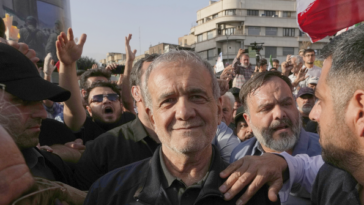 iran’s-president-takes-selfies-on-streets-of-tehran-while-‘supreme-leader’-still-missing