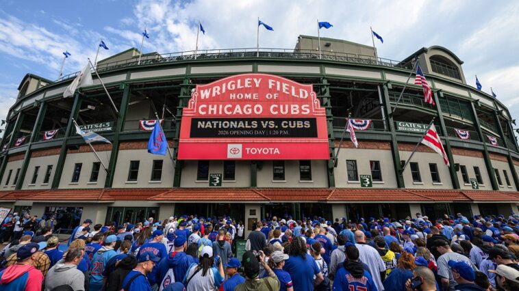 fan-spotted-with-laptop,-apparently-logging-work-hours-from-wrigley-field-stands-during-cubs-day-game