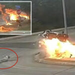 motorcycle-skids-off-the-road-and-explodes-—-narrowly-missing-school-kids-—-in-insane-video