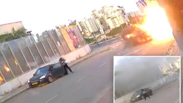 dramatic-moment-israeli-woman-knocked-to-the-ground-as-missile-explodes-next-to-her-—-before-getting-up-and-walking-away