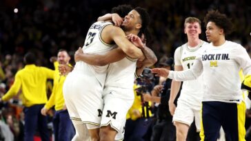 michigan-holds-off-uconn-to-win-2nd-hoops-title