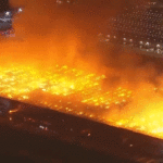 massive-six-alarm-blaze-engulfs-california-warehouse,-employee-detained
