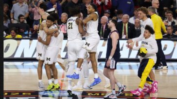 uconn-players-wait-to-shake-hands-with-michigan-after-title-loss-in-classy-final-march-madness-moment