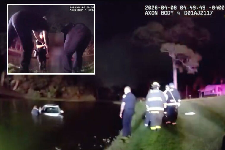 florida-police-rescue-elderly-couple-after-car-slides-into-pond-following-heavy-downpours