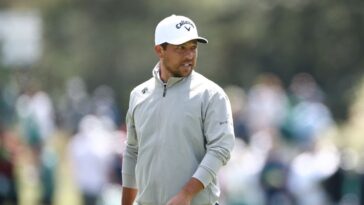 watch:-one-in-a-billion-golf-shot-as-pro’s-tee-shot-lands-in-fan’s-bag,-and-then-he-even-goes-on-to-par-the-hole