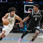 pacers-fans-go-viral-after-animated-conversation-caught-on-camera-during-nets-game-in-brooklyn