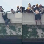 heart-stopping-moment-rescuers-swoop-in-on-man-trying-to-jump-from-la-overpass