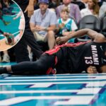 bam-adebayo-exits-play-in-game-with-back-injury-after-lamelo-ball-grabs-his-ankle-in-tie-up