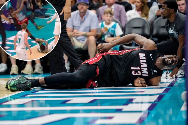 bam-adebayo-exits-play-in-game-with-back-injury-after-lamelo-ball-grabs-his-ankle-in-tie-up