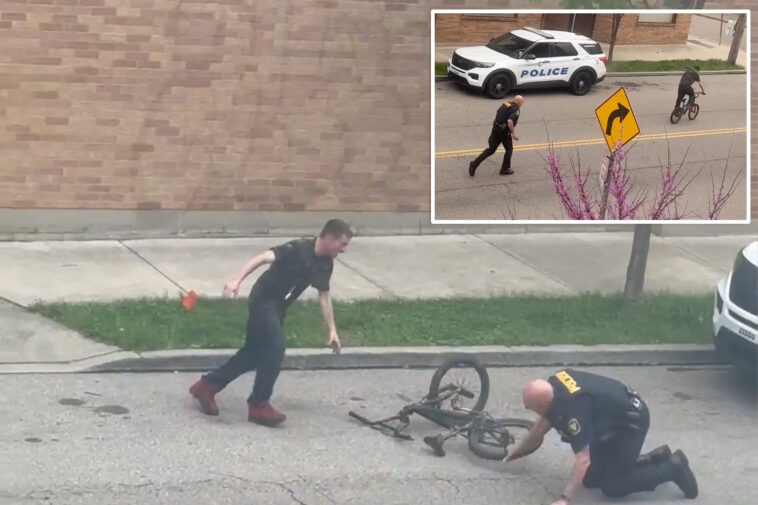 winded-cop-struggles-to-chase-down-bike-riding-rebel-in-viral-‘cat-and-mouse’-scuffle