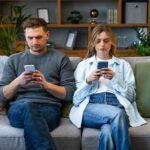 couple-worries-having-a-baby-could-cut-into-time-they-spend-sitting-on-the-couch-staring-at-their-phones