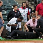 white-sox-longtime-anthem-singer-collapses-on-field-while-performing-black-national-anthem