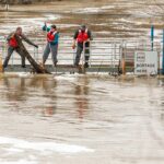 midwestern-drivers-trapped-in-flooded-streets-after-destructive-tornadoes,-record-rainfall
