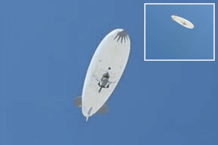 huge-blank-white-airship-sparks-alarm-over-remote-town