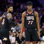 fan-drilled-with-errant-pass-while-on-her-phone-sitting-courtside-at-nba-play-in-tournament