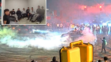 over-200-swarm-atlanta-intersection-in-illegal-street-takeover-roaring-with-cars-racing-and-doing-donuts