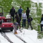 dodgers,-fans-enjoy-snow-day-at-coors-field-in-denver